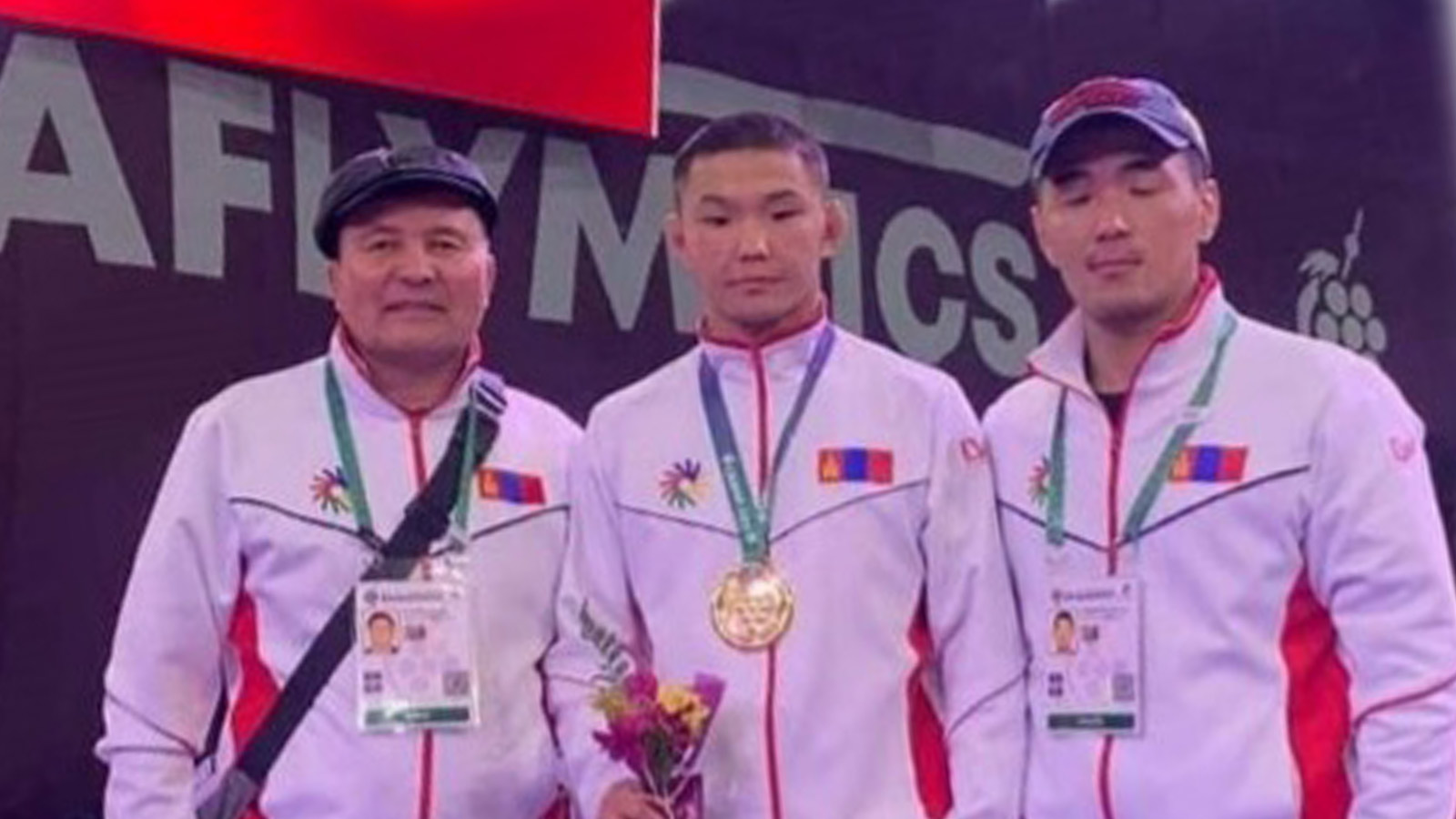 erkhembayar wins gold at deaflympics pictured with coaches and winners