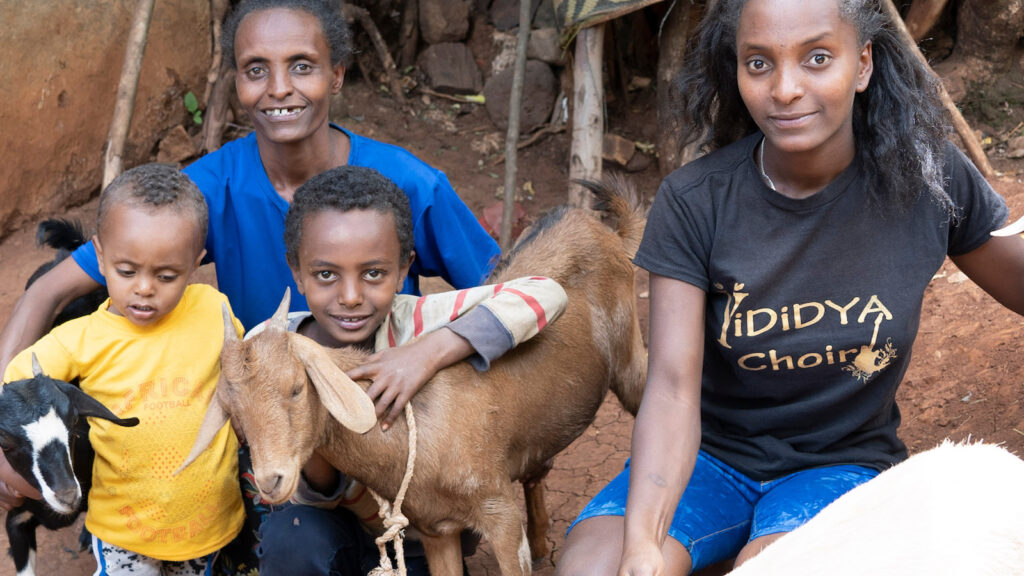 Family in Ethiopia with a goat