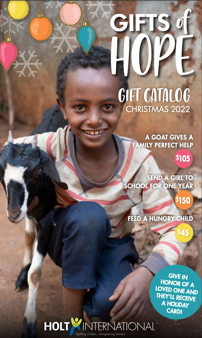 Gifts of Hope Catalog Cover of smiling boy with goat