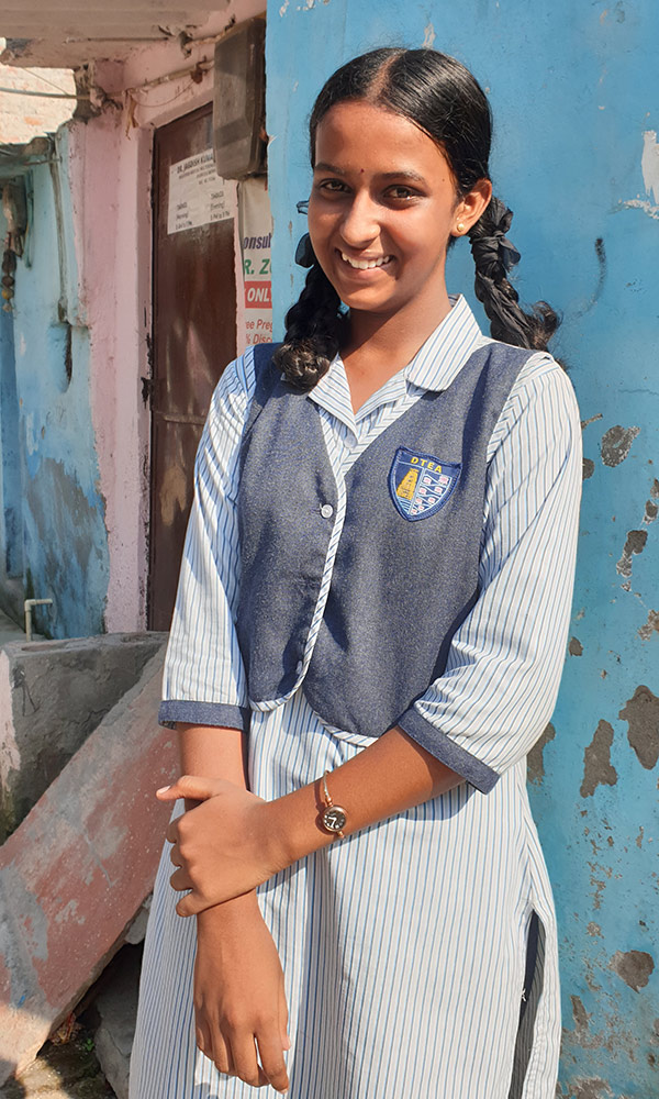child sponsor, Indian student wearing school uniform
