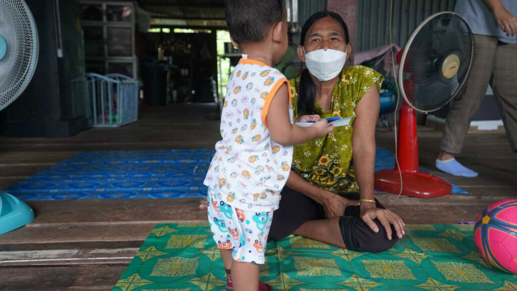 Inflation has increased the cost to care for this boy in foster care in Thailand.