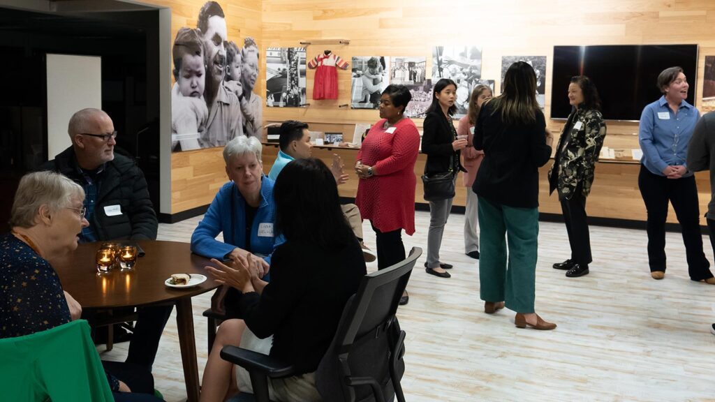 Adoptee gathering in the lobby of Holt's headquarters, November 2022