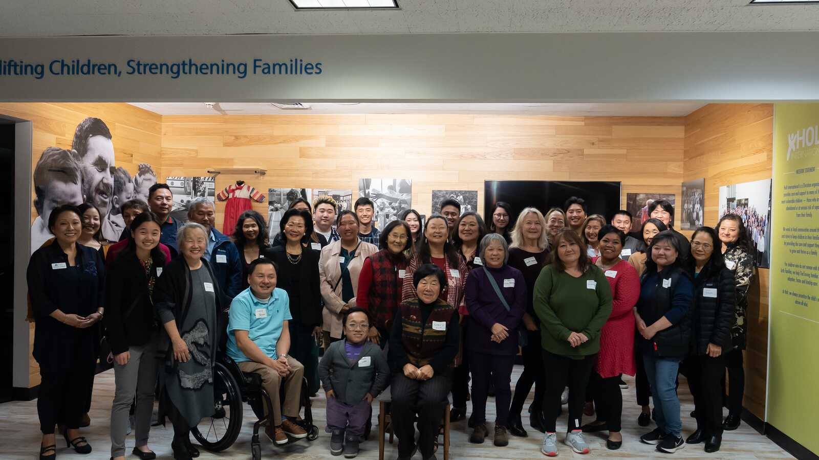 Adoptees and Holt board members and staff at Holt headquarters