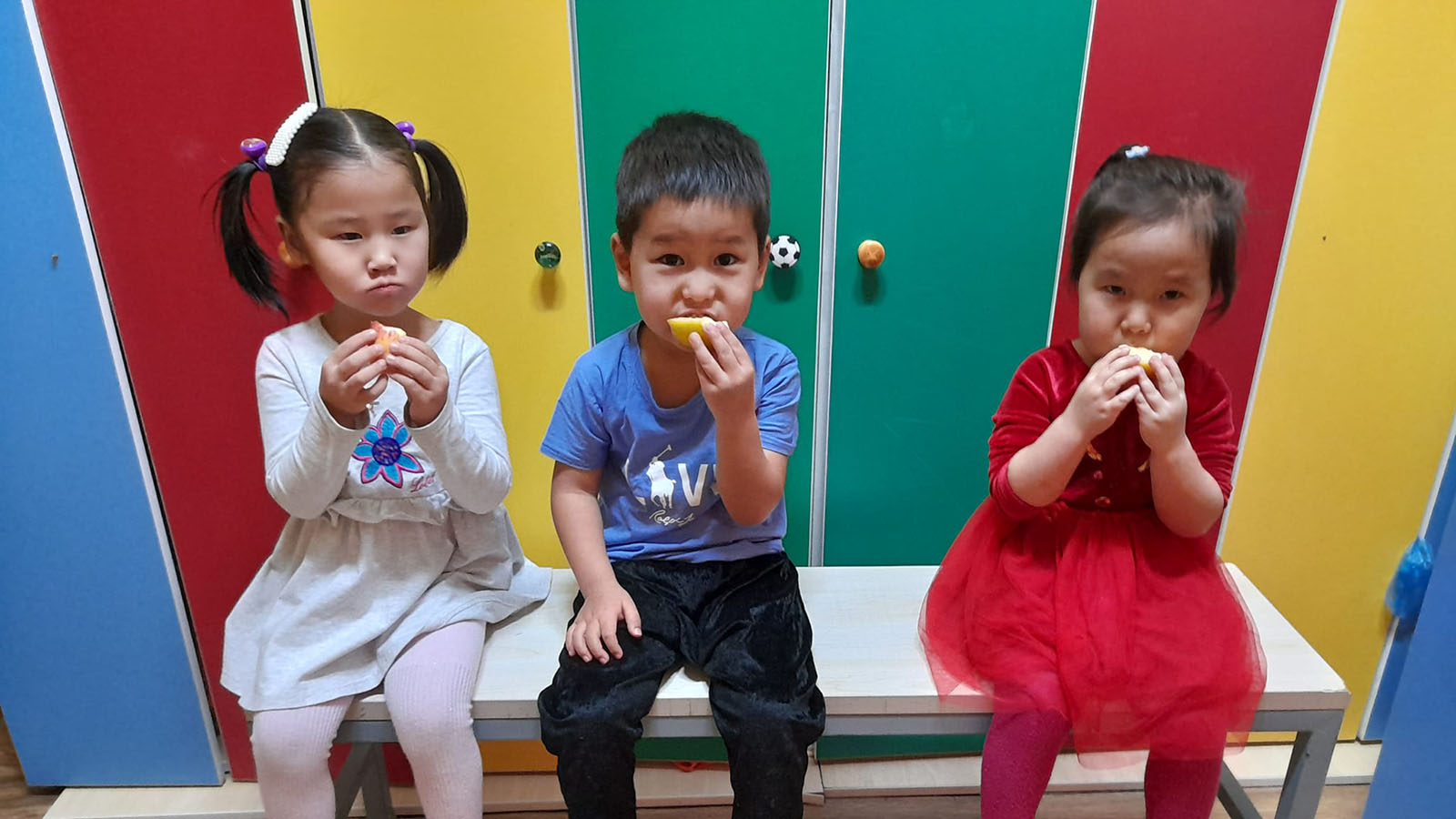 Mongolia 3 kids eating snack child nutrition study