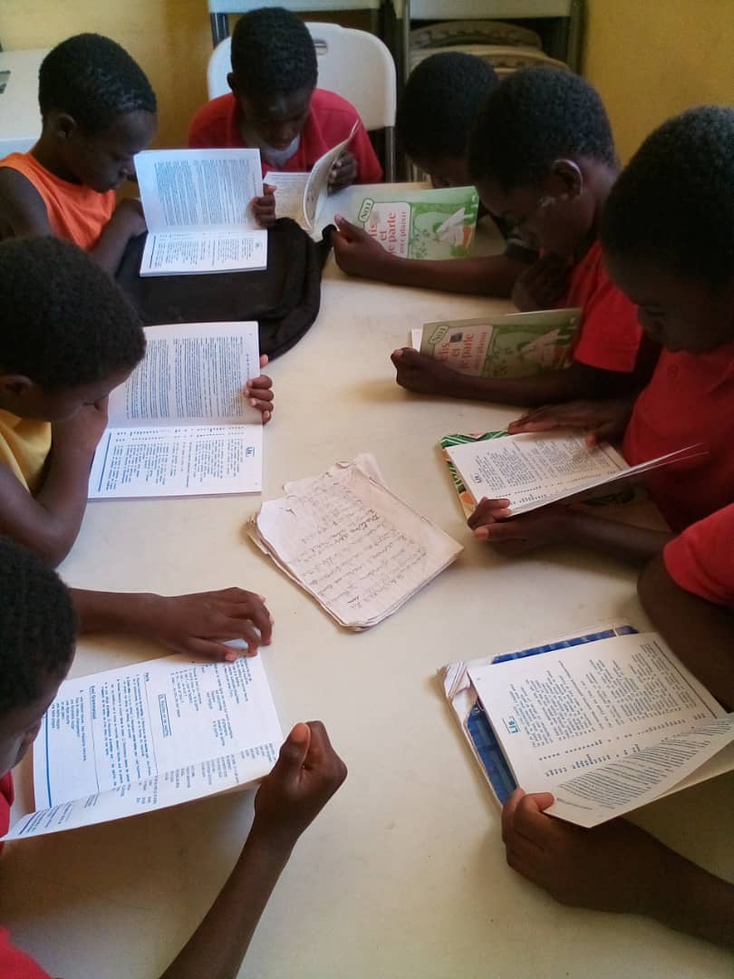 Children in Haiti reading
