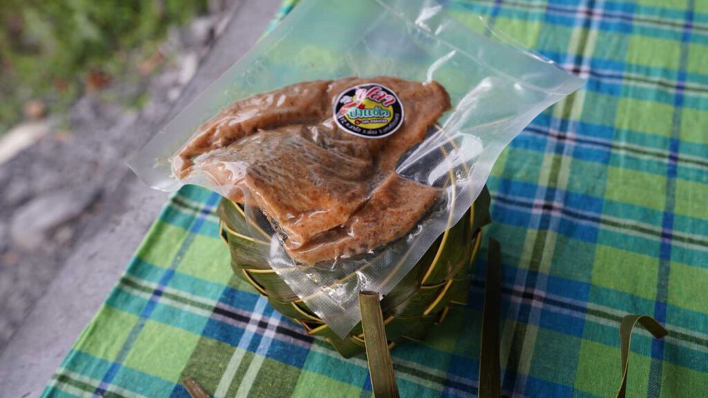 A package of the pickled fish a mom in Thailand turned into a business with the help of Holt's partner.
