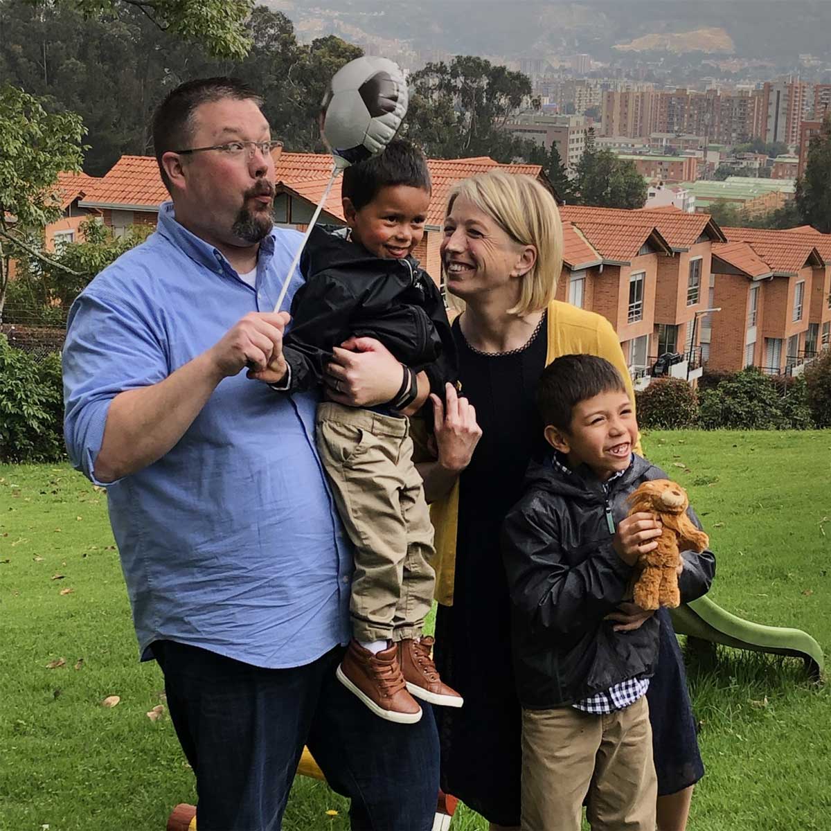 The Traver family with sons in Colombia on adoption day with Holt