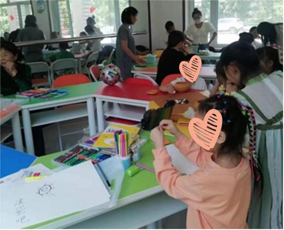 Children do arts and crafts at activity center