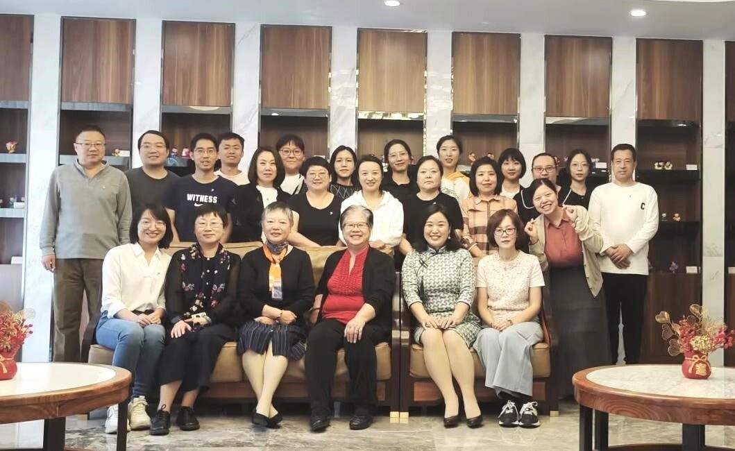 Group of Holt staff in China gather for a photo